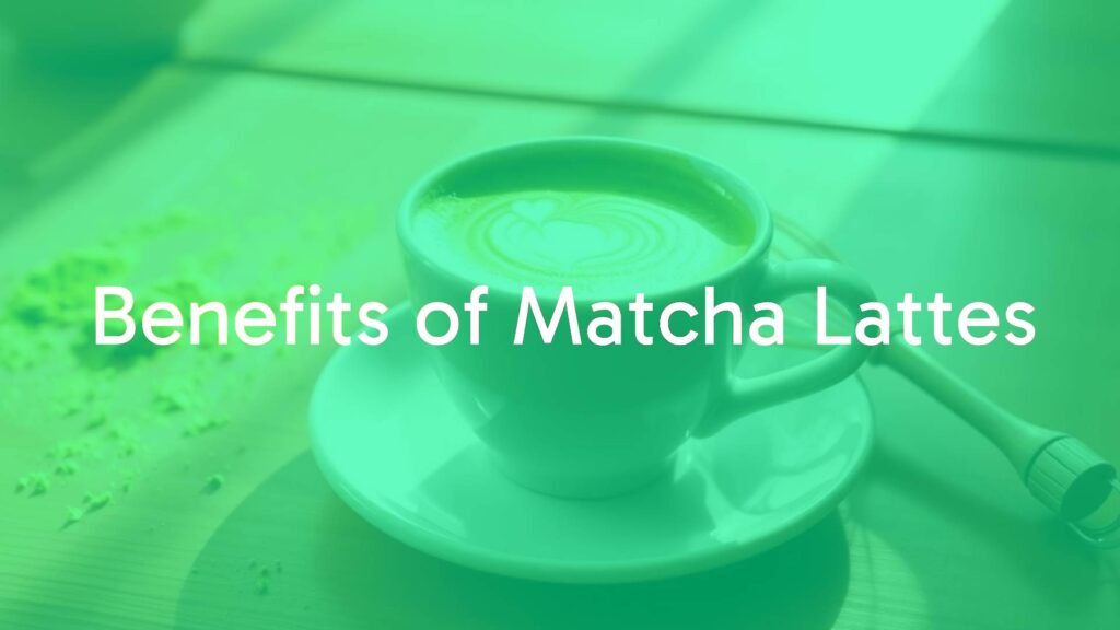 A vibrant matcha latte in a white ceramic cup on a wooden table, scattered matcha powder and whisk nearby, bright natural lighting, cozy and inviting, realistic.
